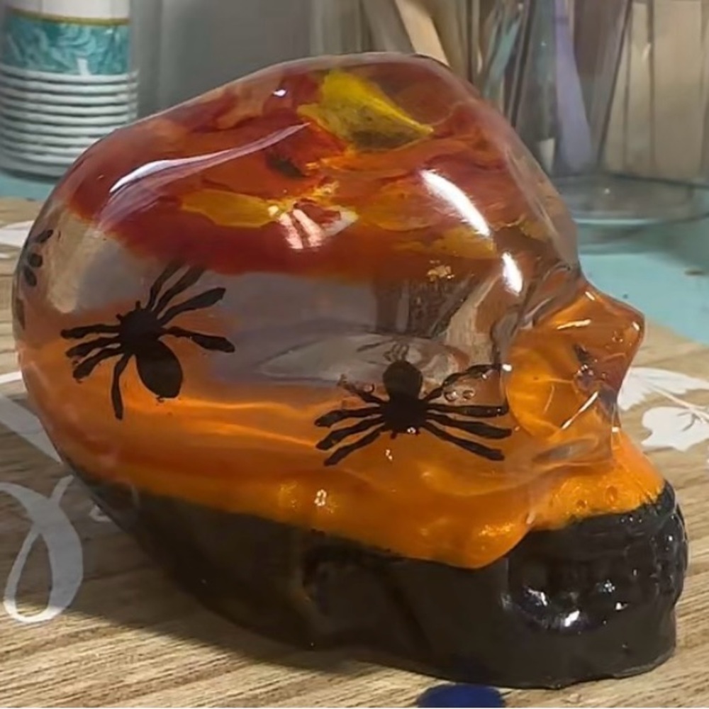 Handmade epoxy resin skull with spider embellishments